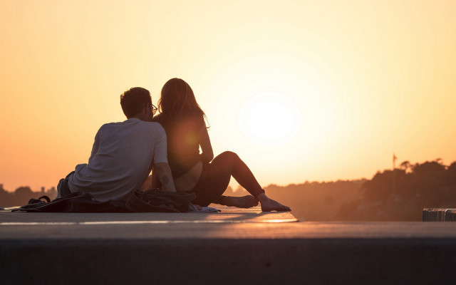 Sunset couple skateboarder romantic ocean free wallpaper - medium preview image
