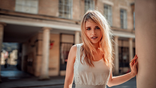 Woman building surprised blonde portrait free wallpaper - medium preview image