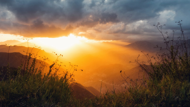 Sunset mountain range grass field free wallpaper - medium preview image