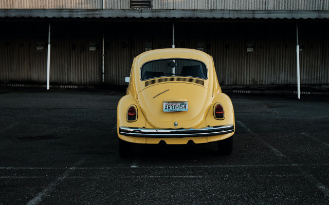 Yellow car parking lot building #3 free wallpaper - medium preview image
