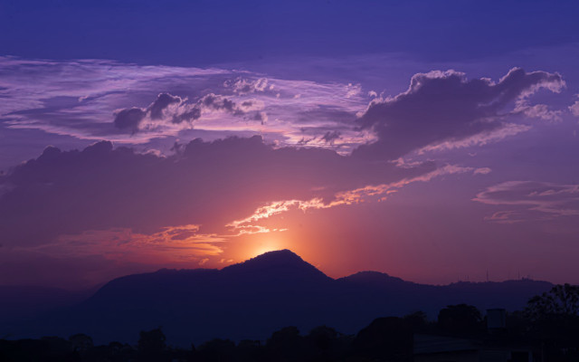Sunset mountain clouds cityscape beach free wallpaper - medium preview image