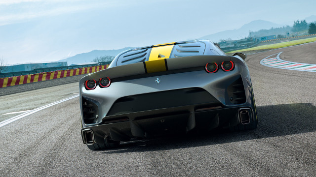 Black yellow sportscar racetrack mountains free wallpaper - medium preview image
