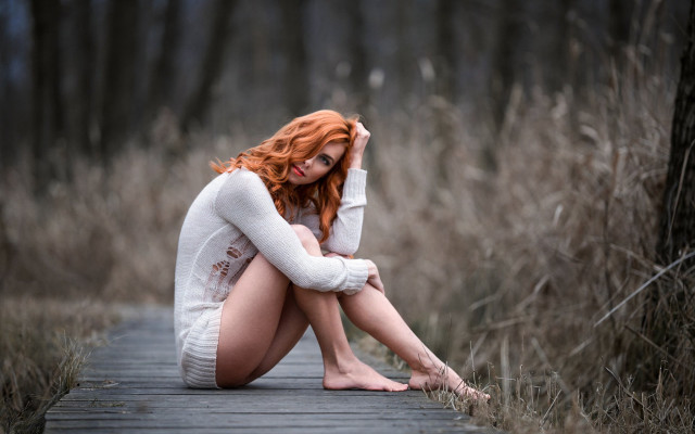 Red haired woman forest sitting #2 free wallpaper - medium preview image