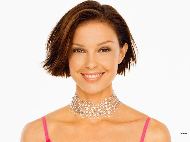 Woman pink dress pearls smiling free wallpaper - medium preview image