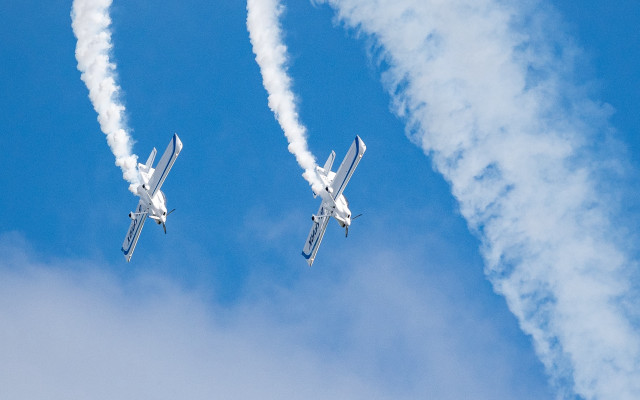 Two airplanes smoke trail precisionism free wallpaper - medium preview image