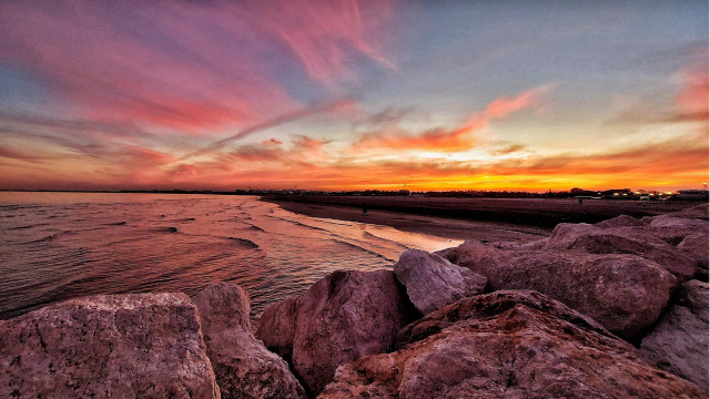 Sunset beach rocks water person #2 free wallpaper - medium preview image