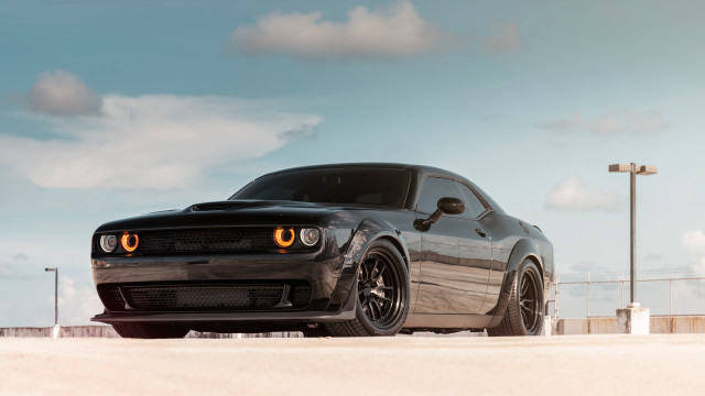 Black car parked streetlight cloudy free wallpaper - medium preview image
