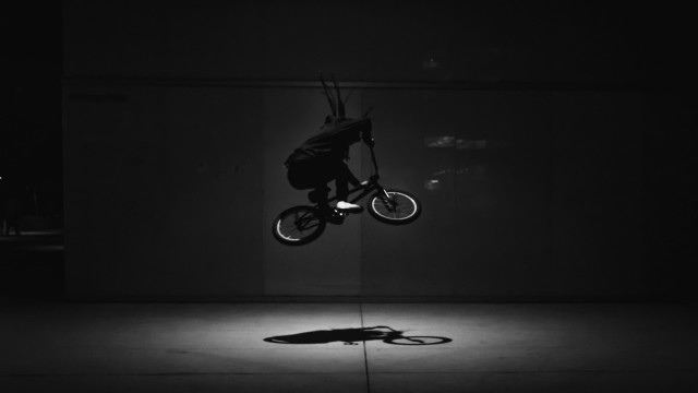 Bike trick shadow cinematic blackwhite free wallpaper - medium preview image