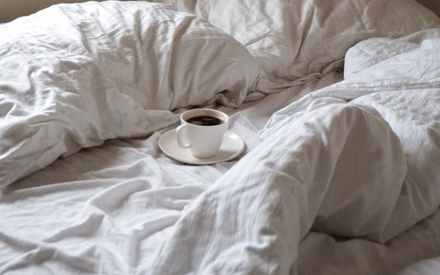 Coffee saucer bed white sheets free wallpaper - medium preview image