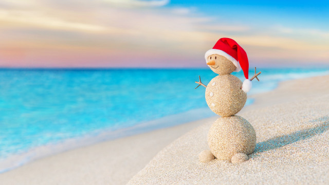 Snowman sand beach santa hat free wallpaper - medium preview image