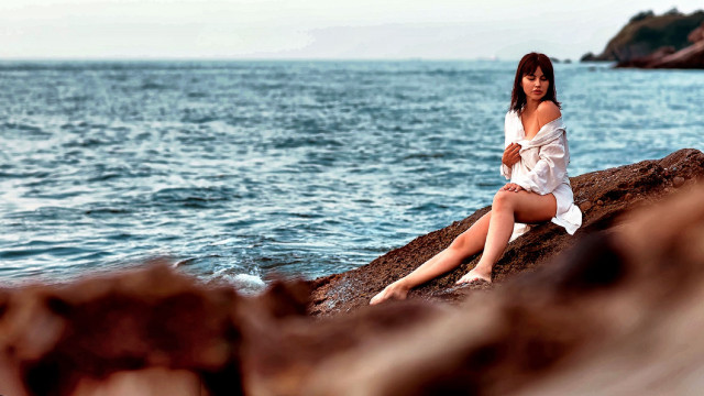 Woman ocean rock sitting barelegs free wallpaper - medium preview image