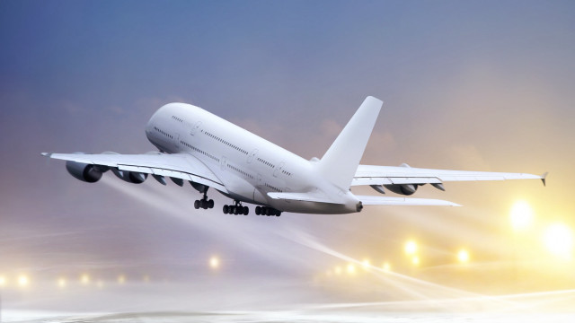 Jetliner cloudy night runway matte free wallpaper - medium preview image