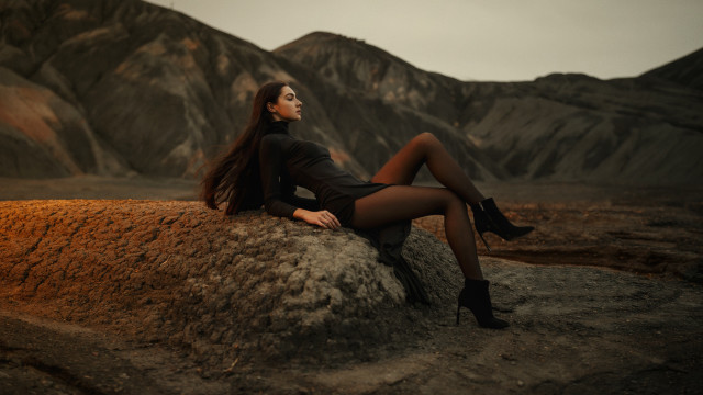 Woman black dress rock mountains free wallpaper - medium preview image