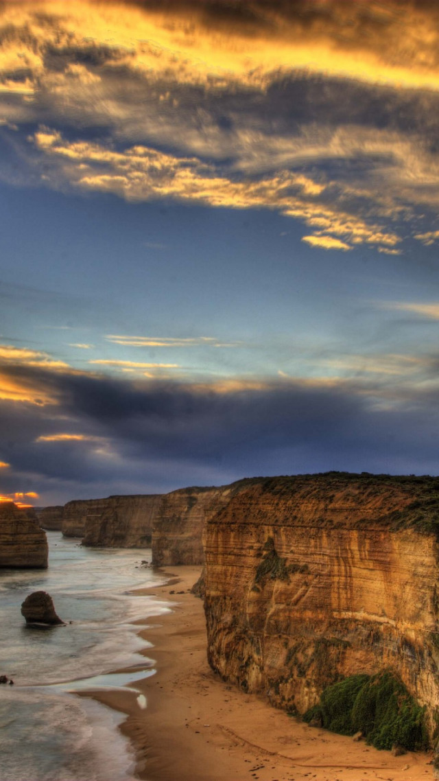 Beach cliff water cloudy sky free wallpaper - medium preview image