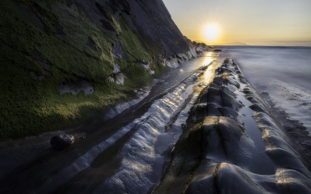 Long rocks beach sunset water free wallpaper - medium preview image