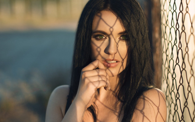 Woman greeneyes fence pose longhair free wallpaper - medium preview image