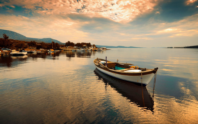 Boat shore houses cloudy sky free wallpaper - medium preview image