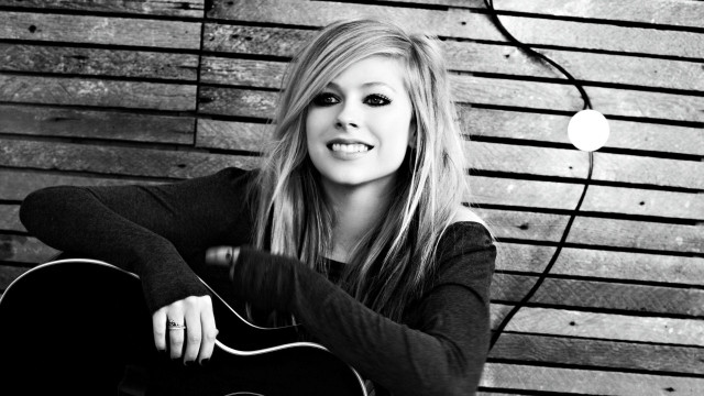 Woman long hair holding guitar #2 free wallpaper - medium preview image