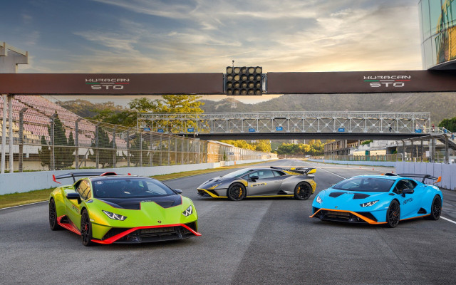 Three colored sports cars race free wallpaper - medium preview image