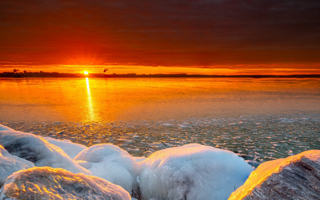 Sunset water ice rocks boat free wallpaper - medium preview image