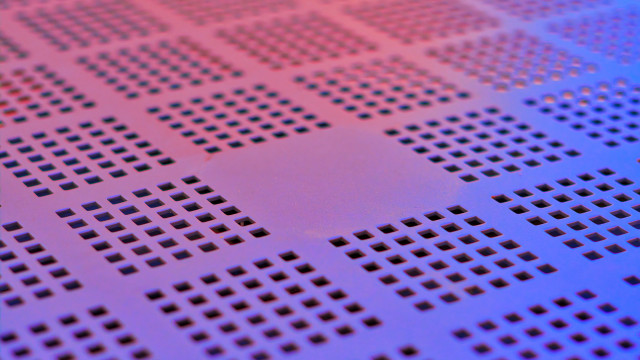 Metal holes red dot tiltshift free wallpaper - medium preview image