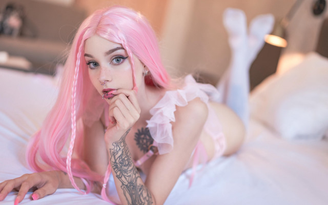 Pink haired woman tattoo bed free wallpaper - medium preview image