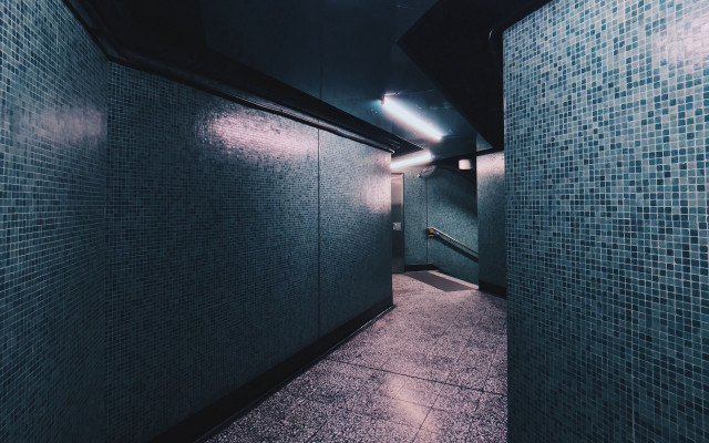 Long hallway tiles metal rail free wallpaper - medium preview image