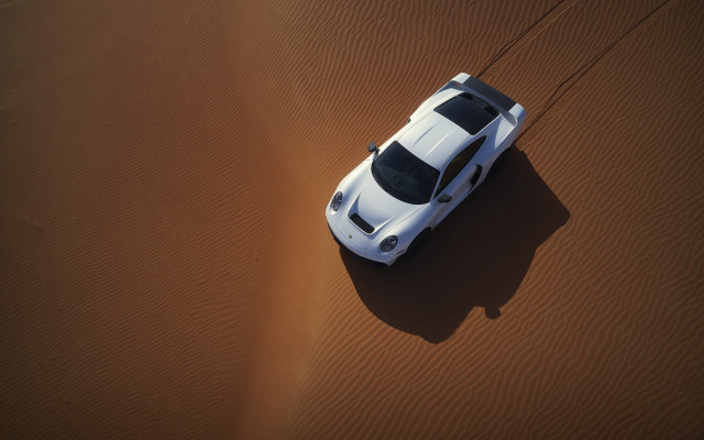 White car driving desert sand free wallpaper - medium preview image