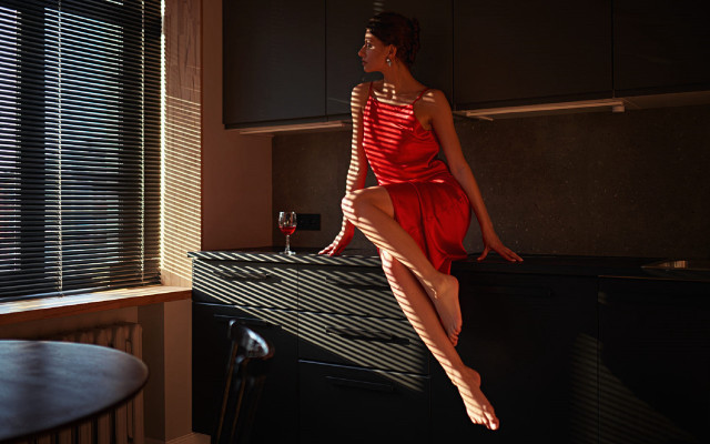 Woman red dress indoors sitting free wallpaper - medium preview image