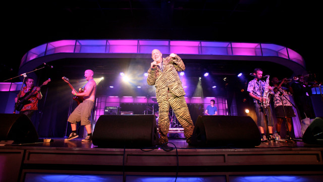 Man stage microphone band performance free wallpaper - medium preview image