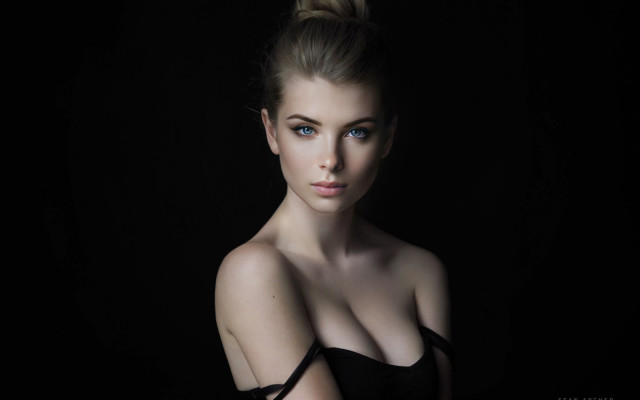 Woman bun blueeyes dark background free wallpaper - medium preview image