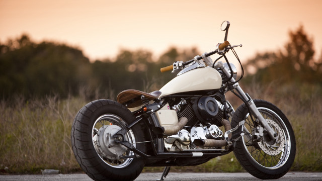 White motorcycle sunset trees grass free wallpaper - medium preview image