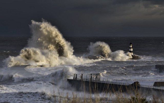 Lighthouse waves stormy weather scene free wallpaper - medium preview image