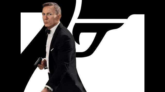 Man suit tie gun poster free wallpaper - medium preview image