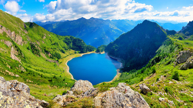 Lake mountains grass sunny clouds free wallpaper - medium preview image