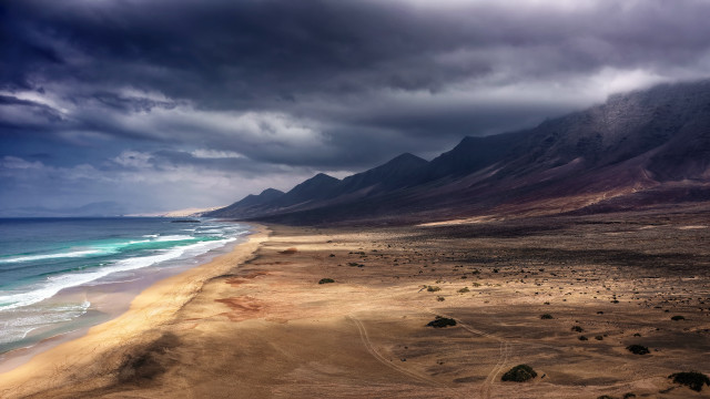 Beach mountain cloudy sky ocean free wallpaper - medium preview image