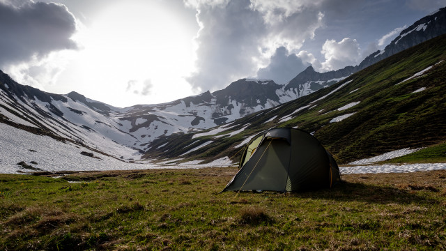Tent field mountains clouds tilt free wallpaper - medium preview image
