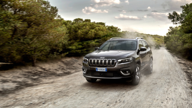 Jeep dirt road cloudy nature free wallpaper - medium preview image
