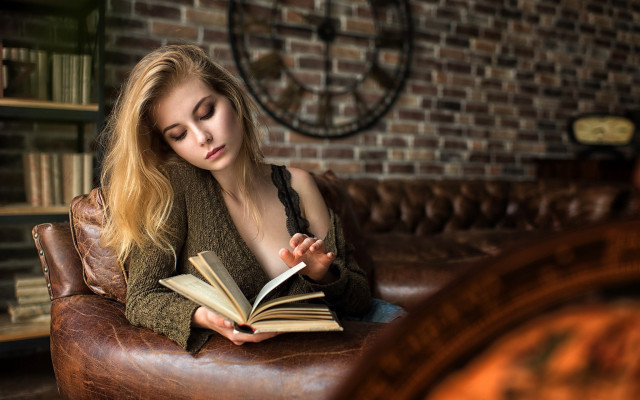 Woman sitting reading book brick free wallpaper - medium preview image