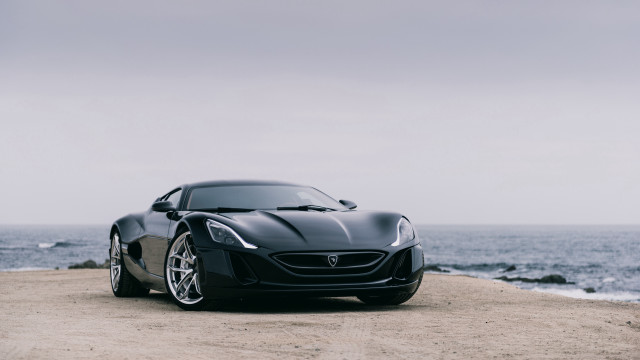 Black sports car beach ocean free wallpaper - medium preview image