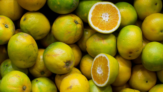 Lemons halved eaten pile orange free wallpaper - medium preview image