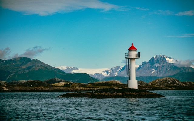 Lighthouse island lake mountains sky free wallpaper - medium preview image