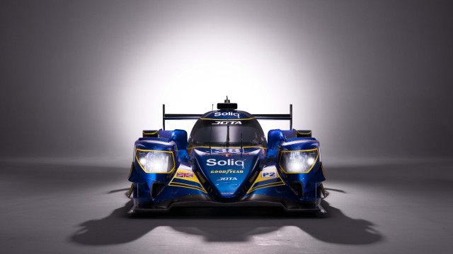 Blue yellow racecar shadow vorticism free wallpaper - medium preview image