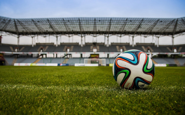 Soccer ball green field stadium free wallpaper - medium preview image