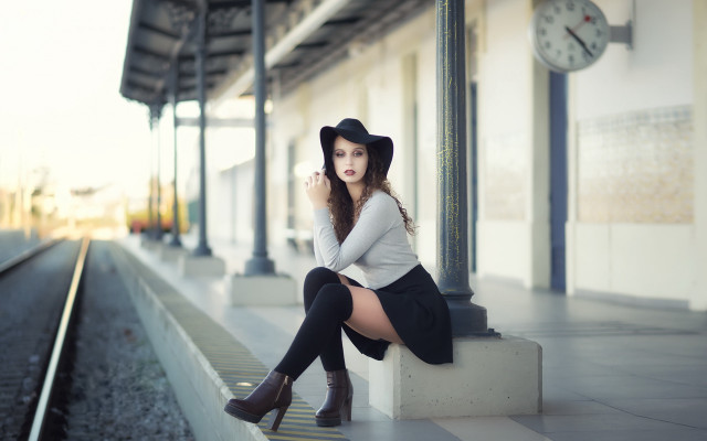 Woman bench trainstation clock fashion free wallpaper - medium preview image