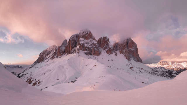 Snowy mountain skier cloudy sunset free wallpaper - medium preview image