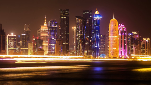 City skyline night lights boat #2 free wallpaper - medium preview image