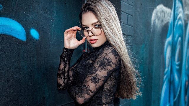 Woman black dress posing city free wallpaper - medium preview image