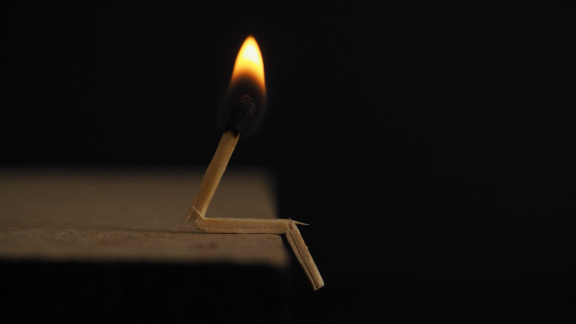 Matchstick lit dark minimalism microscopic free wallpaper - medium preview image
