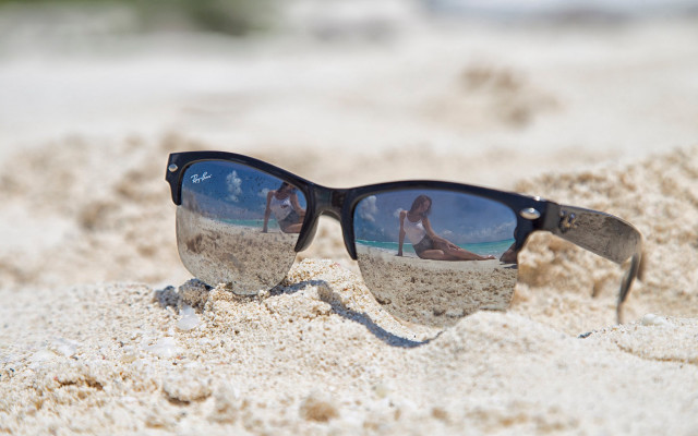 Sunglasses reflection woman beach sand free wallpaper - medium preview image